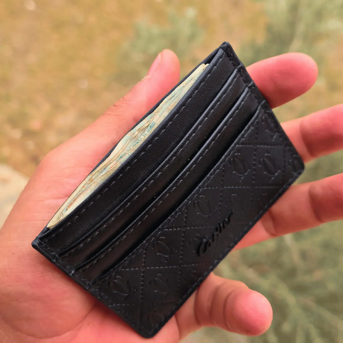 حامل بطافه كارتير أسود